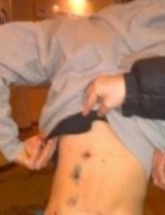 Силовики обстреляли двух мужчин в центре Киева (фото, видео)