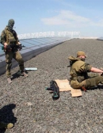 В аэропорту Донецка продолжается жестокое противостояние. Террористы вызвали подмогу (фото, видео)