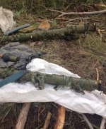 На Харьковщине обнаружен тайник с российским оружием (фото)