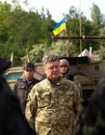 Порошенко в зоне АТО распорядился прекратить огонь на неделю