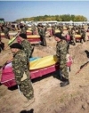 Под Запорожьем похоронили неидентифицированных украинских военных (ВИДЕО)