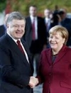 Порошенко в Германии: Украина остается преданной Минским договоренностям (видео)